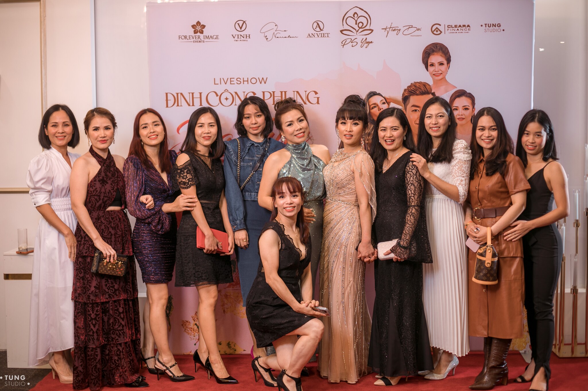 A group portrait of guests gathered at the live show